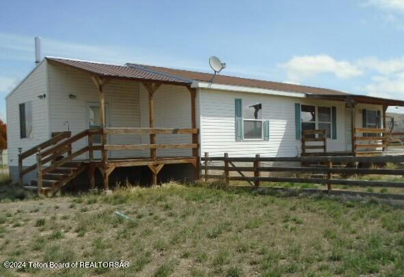 611 W 6TH AVE, LABARGE, WY 83123, photo 1 of 15